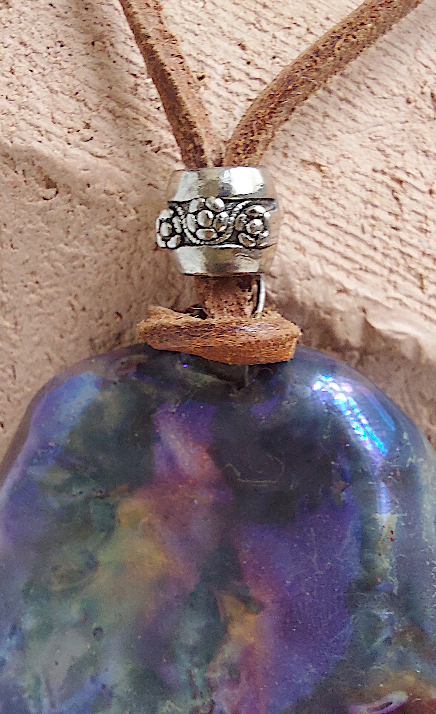 Double face pendant with one textured and one smooth side By Marwa Zakaria