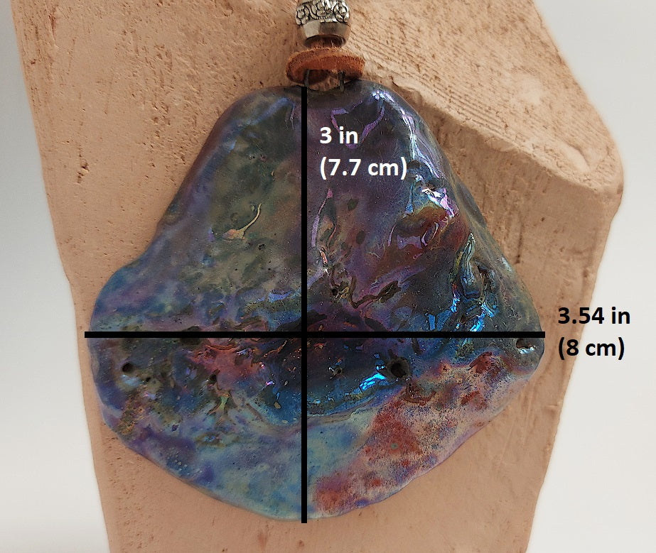 Double face pendant with one textured and one smooth side By Marwa Zakaria